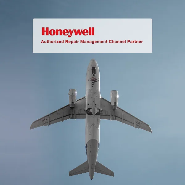 Airliner overhead with the Honeywell Authorized Repair Management Channel Partner badge